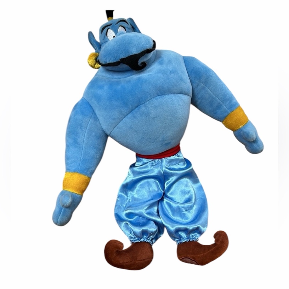 Disney Store brand Genie stuffed toy.  Good used condition, approximately 18” .
